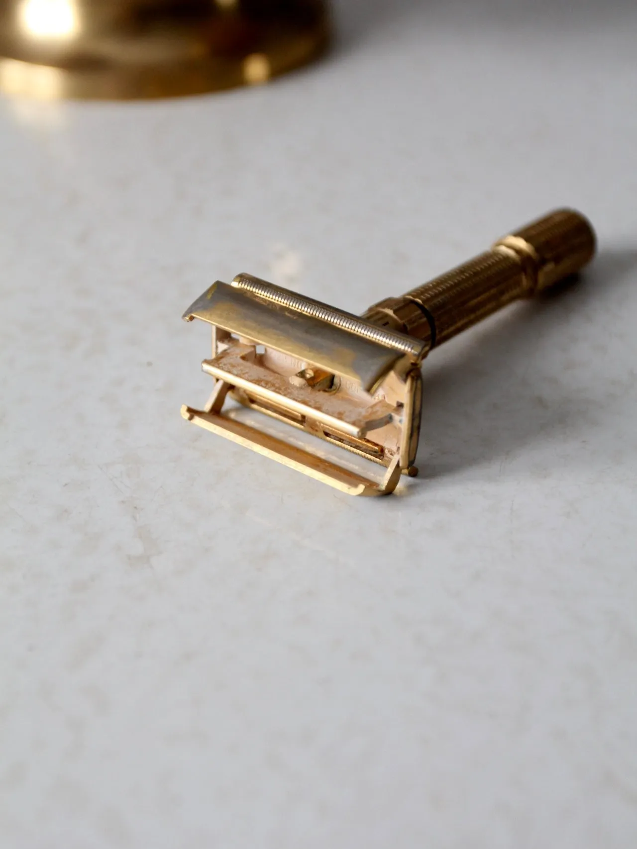 antique brass grooming stand with mirror and Gillette razor