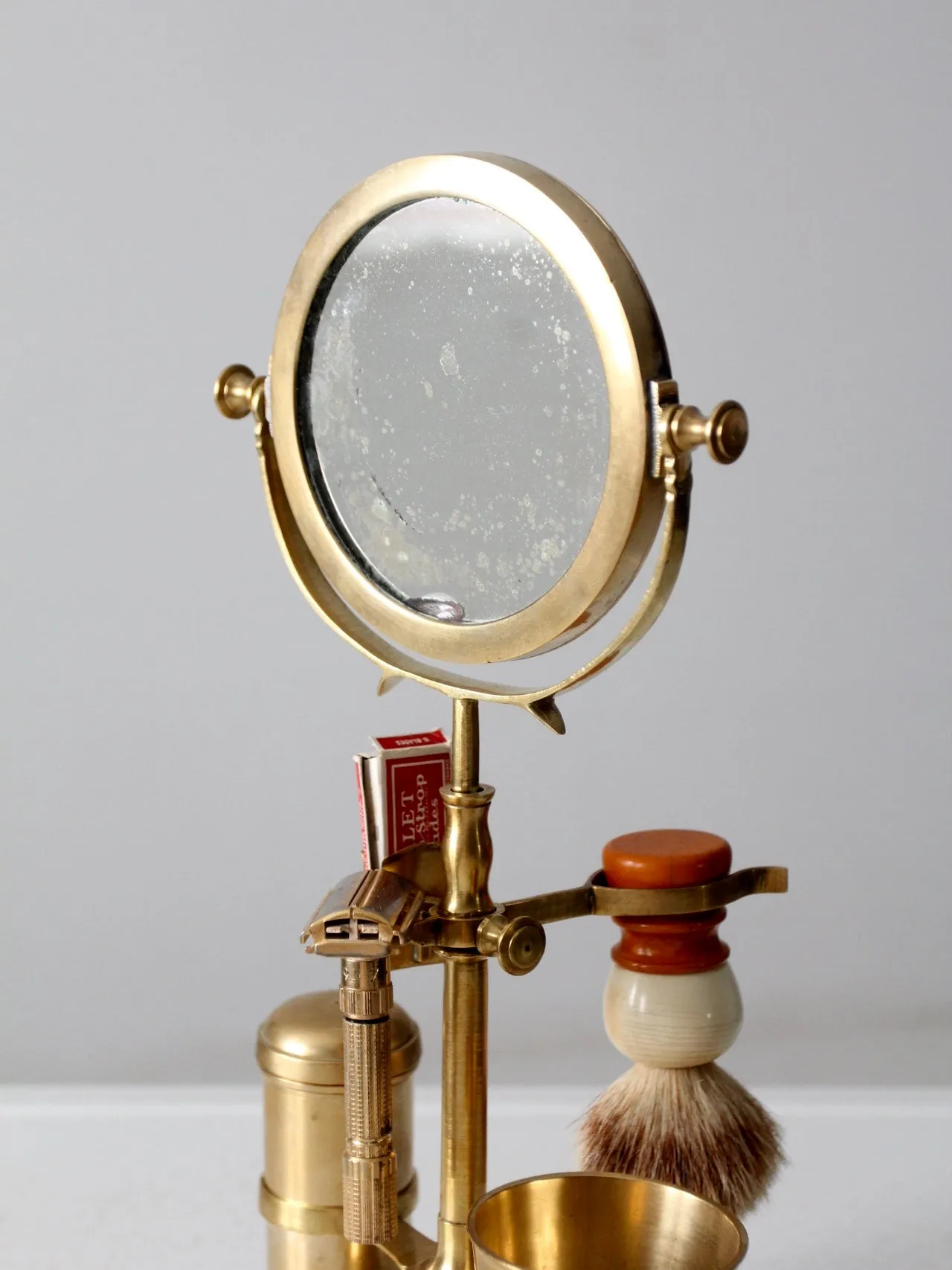 antique brass grooming stand with mirror and Gillette razor