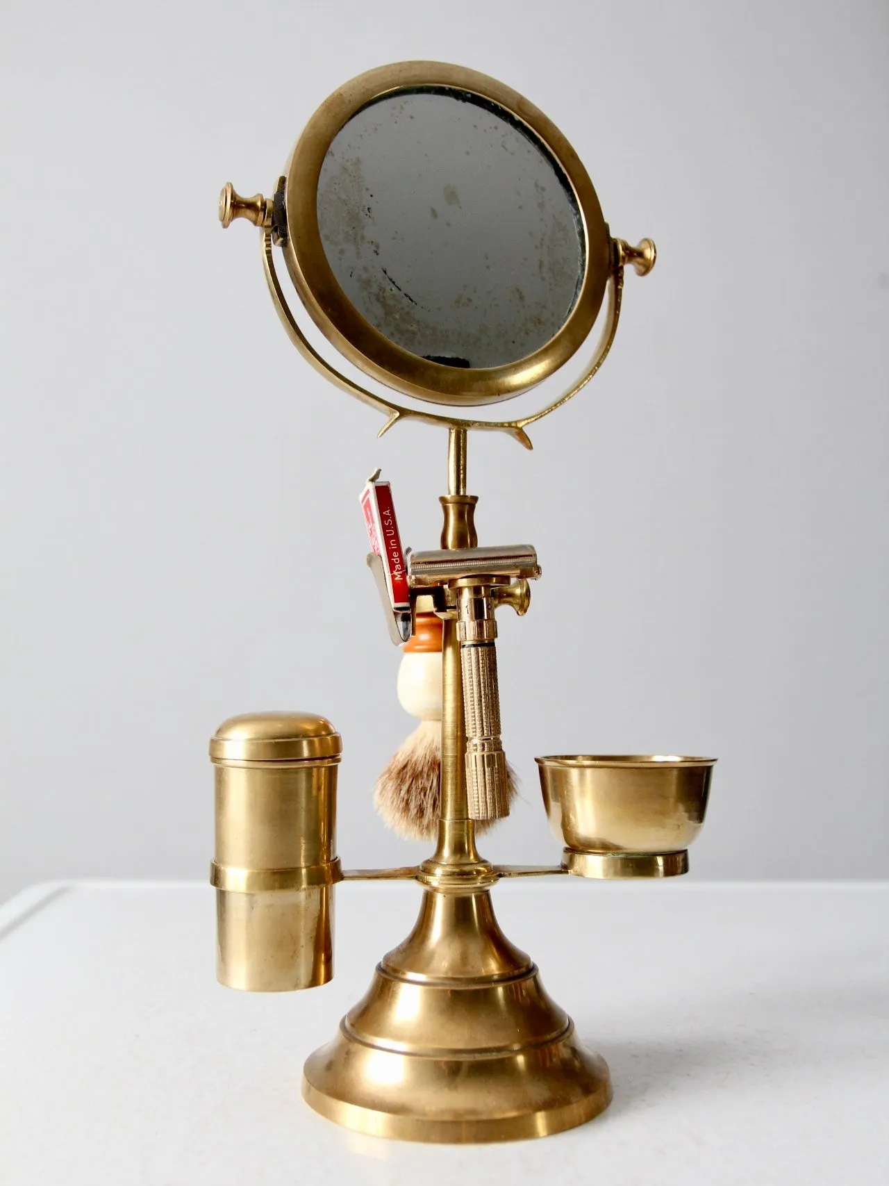 antique brass grooming stand with mirror and Gillette razor